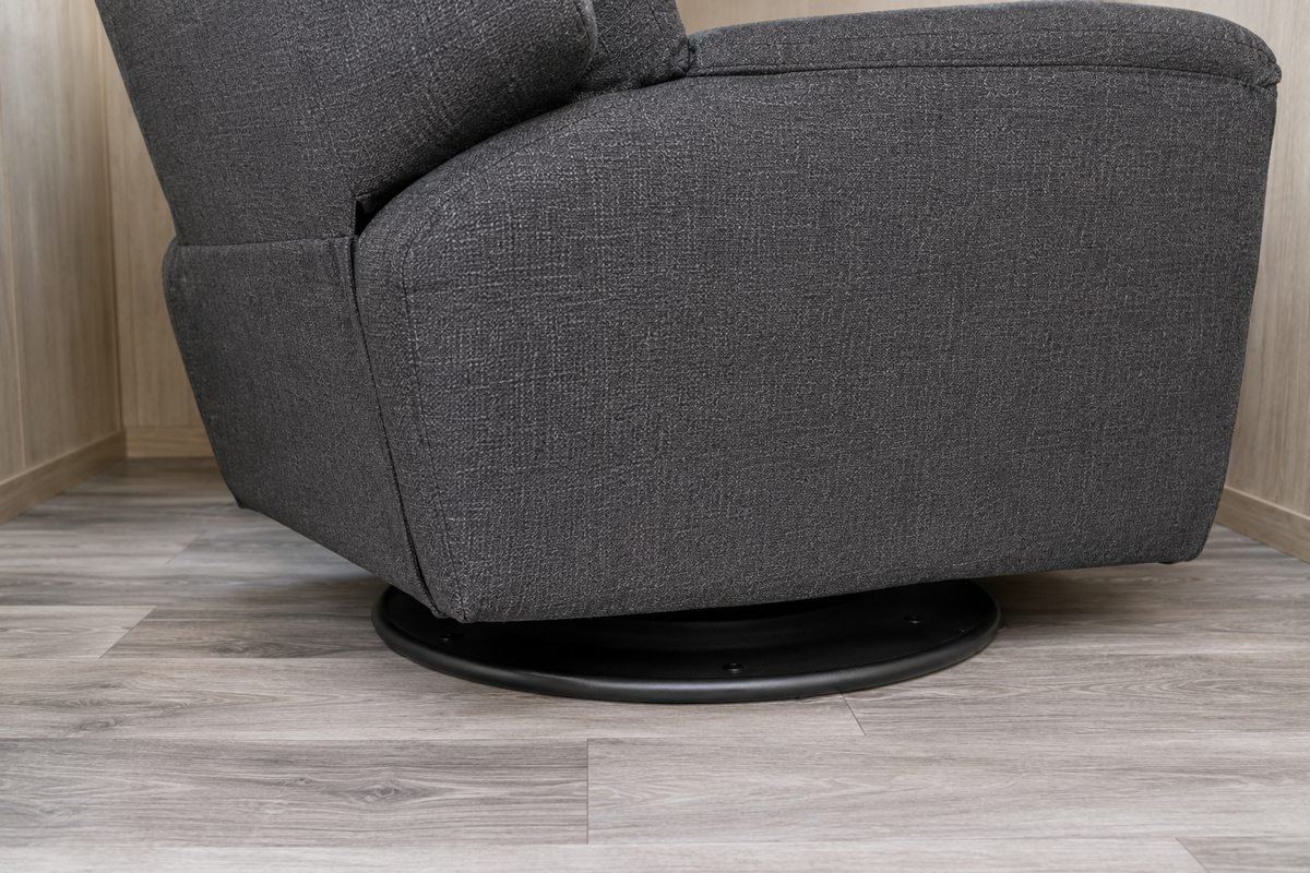 Swivel base of a wall hugger recliner on RV vinyl plank flooring